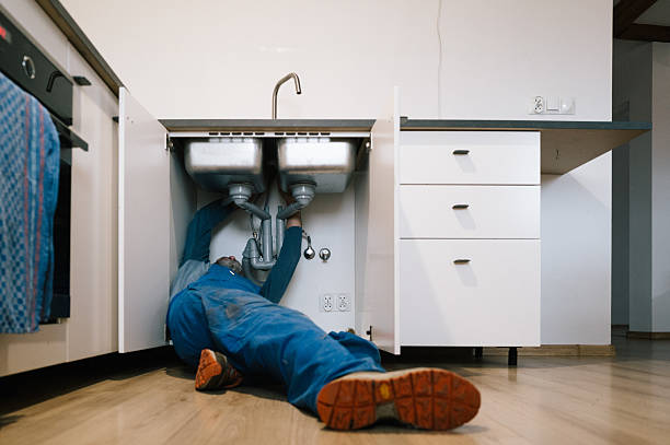 Professional Emergency Plumber technician working in Warren, MN